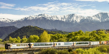 Coastal Pacific Train crossing Kahutara River